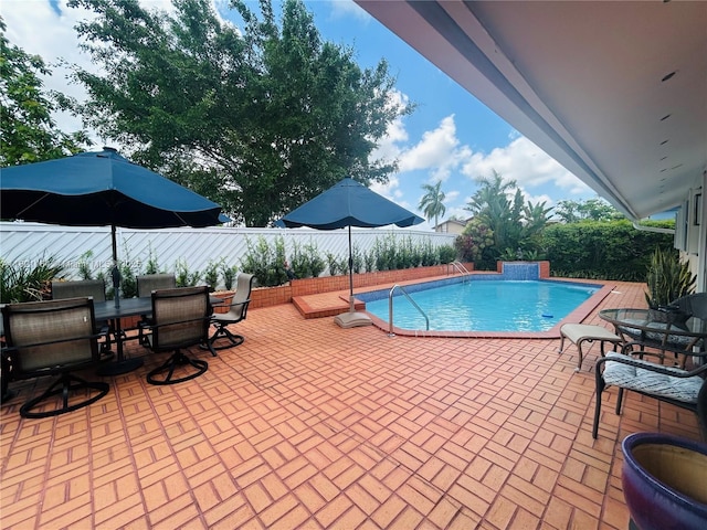 13205 SW 119th St, Miami, FL 33186 - view of pool with a patio area, a fenced backyard, and outdoor dining area