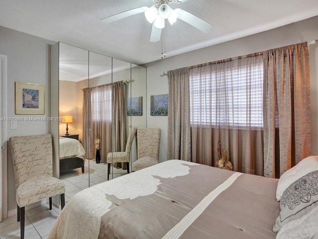 16901 NE 13th Ave Unit 110, Miami, FL 33162 - tiled bedroom with a closet and a ceiling fan