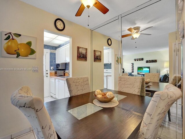 16901 NE 13th Ave Unit 110, Miami, FL 33162 - dining area featuring ceiling fan and light tile patterned flooring