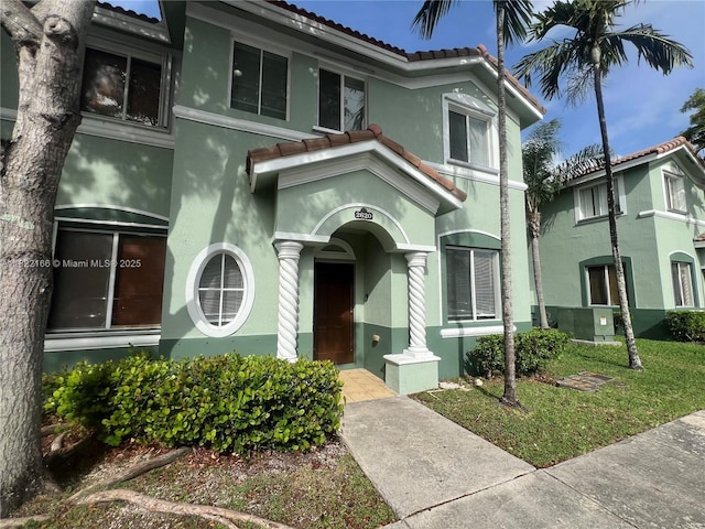 2620 SE 14th Ave Unit 304, Homestead, FL 33035 - mediterranean / spanish-style house with stucco siding and a tiled roof