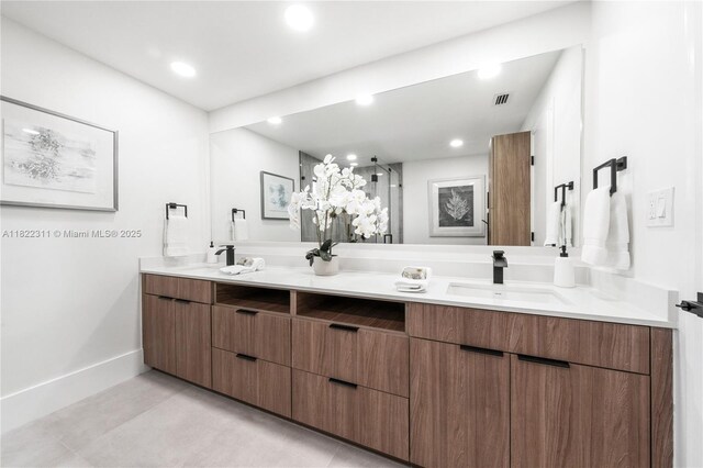 2019 NW 108th Ln, Coral Springs, FL 33071 - bathroom with double vanity, recessed lighting, tile patterned floors, and a shower with shower door