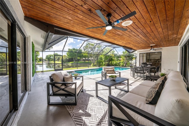2019 NW 108th Ln, Coral Springs, FL 33071 - view of patio / terrace with an outdoor hangout area, ceiling fan, and an outdoor pool