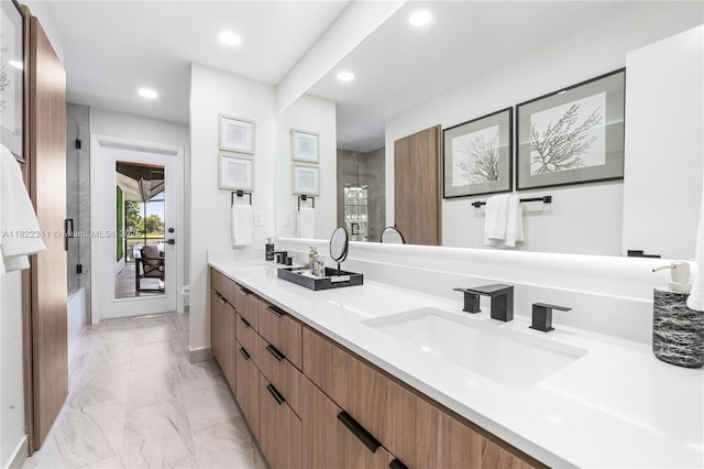 2019 NW 108th Ln, Coral Springs, FL 33071 - full bathroom with double vanity, marble finish flooring, recessed lighting, and a shower with shower door