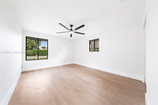 2019 NW 108th Ln, Coral Springs, FL 33071 - empty room featuring wood finished floors and ceiling fan