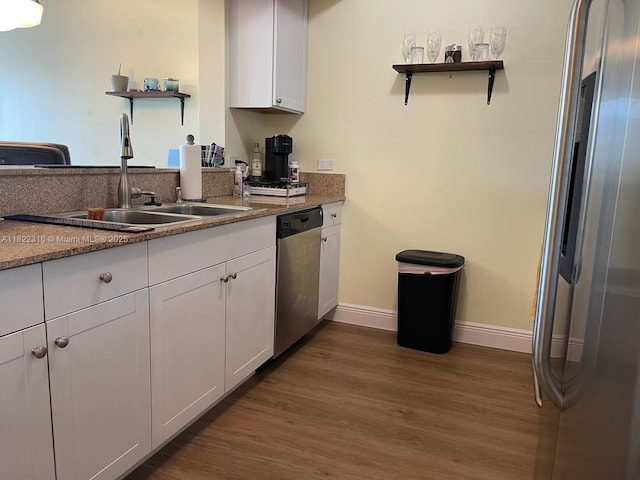 117 NW 42nd Ave Unit 1506, Miami, FL 33126 - kitchen featuring open shelves, appliances with stainless steel finishes, dark wood-style floors, and white cabinets