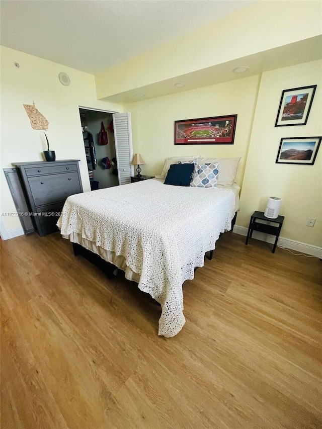 117 NW 42nd Ave Unit 1506, Miami, FL 33126 - bedroom with wood finished floors and a closet