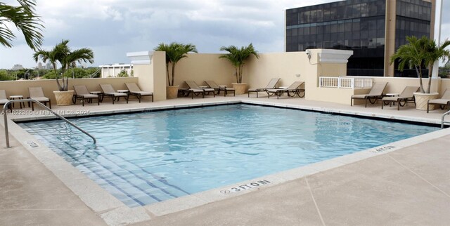 117 NW 42nd Ave Unit 1506, Miami, FL 33126 - community pool featuring a patio area
