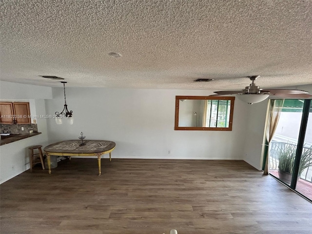 12666 NW 14th Pl Unit 12666, Sunrise, FL 33323 - dining room featuring wood finished floors, a textured ceiling, and ceiling fan