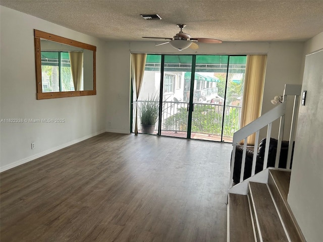 12666 NW 14th Pl Unit 12666, Sunrise, FL 33323 - unfurnished living room with a ceiling fan, wood finished floors, and a textured ceiling