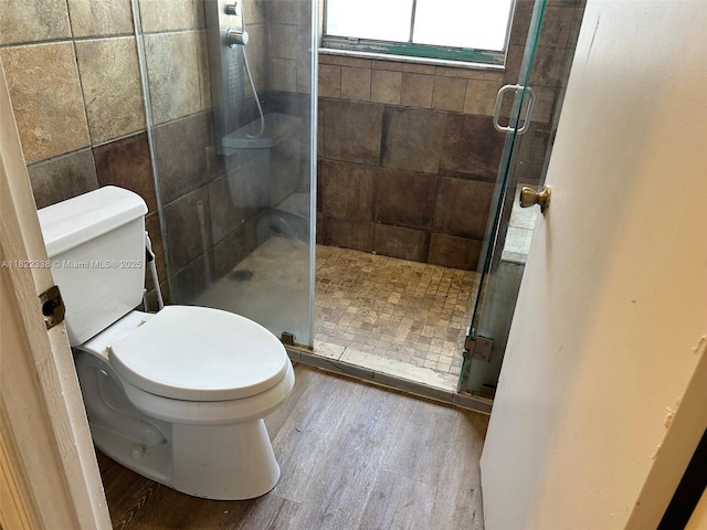 12666 NW 14th Pl Unit 12666, Sunrise, FL 33323 - full bathroom featuring wood finished floors and a stall shower