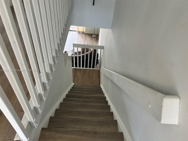 12666 NW 14th Pl Unit 12666, Sunrise, FL 33323 - staircase featuring wood finished floors