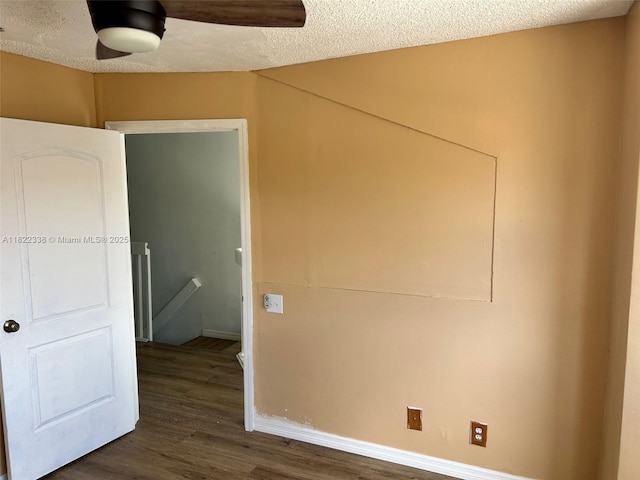 12666 NW 14th Pl Unit 12666, Sunrise, FL 33323 - unfurnished room featuring dark wood finished floors and a textured ceiling