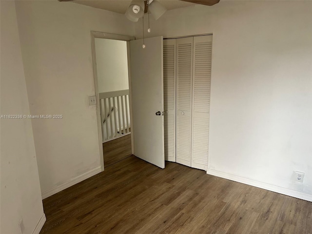 12666 NW 14th Pl Unit 12666, Sunrise, FL 33323 - unfurnished bedroom with wood finished floors, a closet, and a ceiling fan