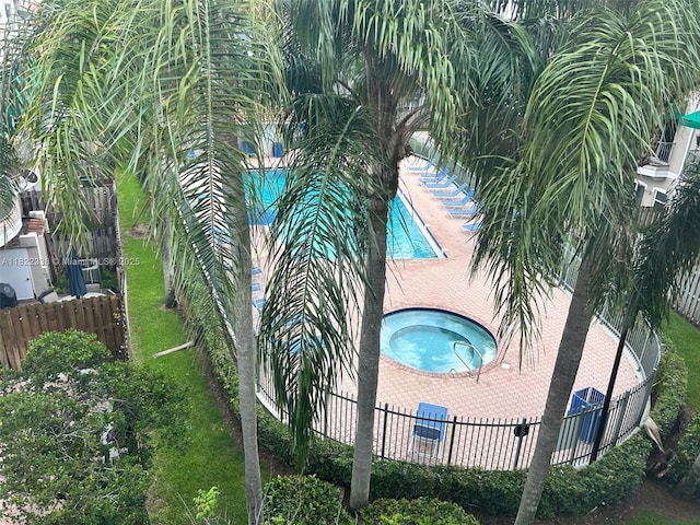 12666 NW 14th Pl Unit 12666, Sunrise, FL 33323 - community pool featuring a hot tub and a patio area