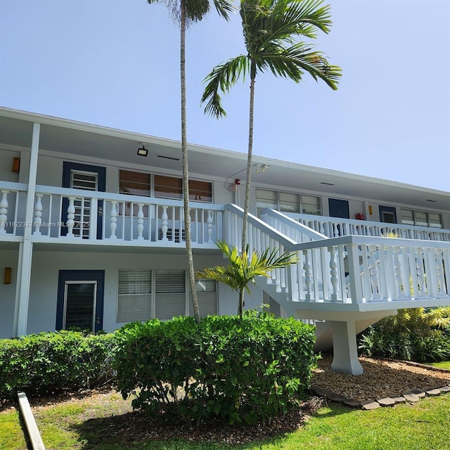 20 Prescott A 20, Deerfield Beach, FL 33442 - view of side of property with stucco siding
