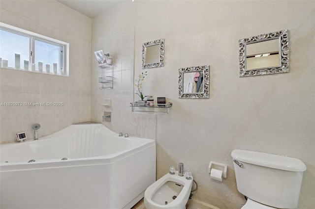 8981 NW 166th Ter, Miami Lakes, FL 33018 - full bathroom featuring a tub with jets and a bidet