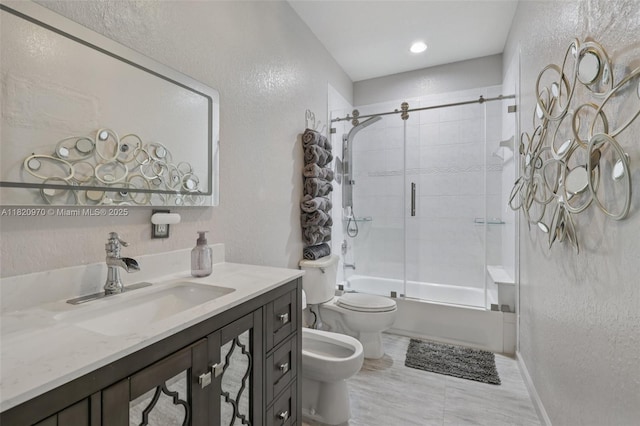8981 NW 166th Ter, Miami Lakes, FL 33018 - bathroom with a textured wall, a bidet, vanity, and enclosed tub / shower combo