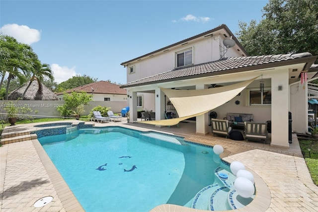 8981 NW 166th Ter, Miami Lakes, FL 33018 - rear view of property with an outdoor living space, a patio area, a tile roof, a fenced backyard, and ceiling fan