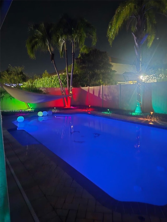 8981 NW 166th Ter, Miami Lakes, FL 33018 - view of pool at night