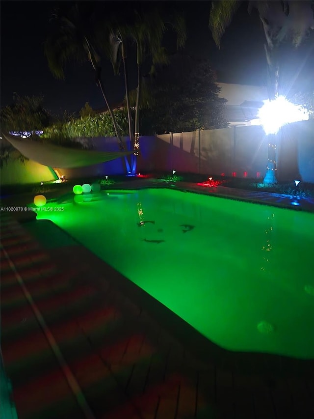 8981 NW 166th Ter, Miami Lakes, FL 33018 - view of pool at twilight