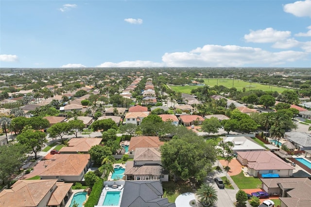8981 NW 166th Ter, Miami Lakes, FL 33018 - aerial perspective of suburban area with a pool area