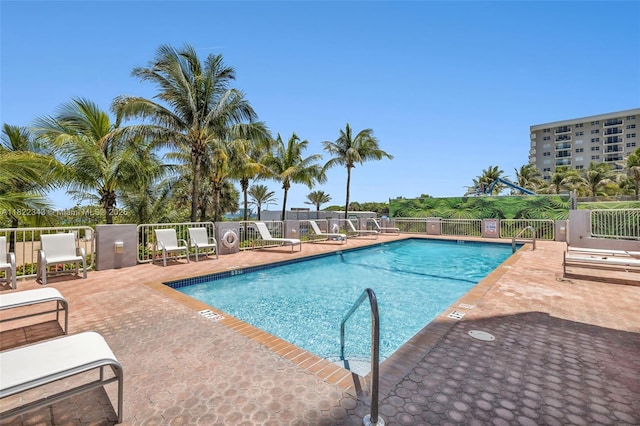 9341 Collins Ave Unit 705, Surfside, FL 33154 - community pool with a patio area
