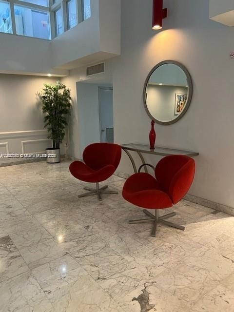 9341 Collins Ave Unit 705, Surfside, FL 33154 - community lobby featuring a towering ceiling