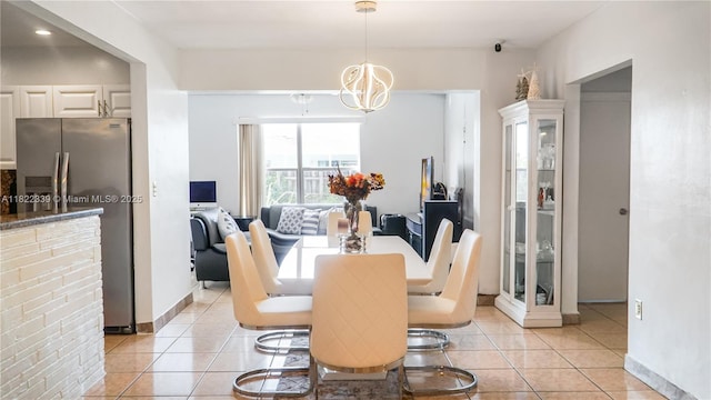 7795 Granada Blvd, Miramar, FL 33023 - dining room with light tile patterned floors, a chandelier, and recessed lighting