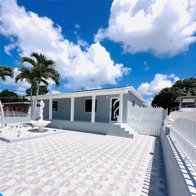 82 E 16th St, Hialeah, FL 33010 - back of property with stucco siding