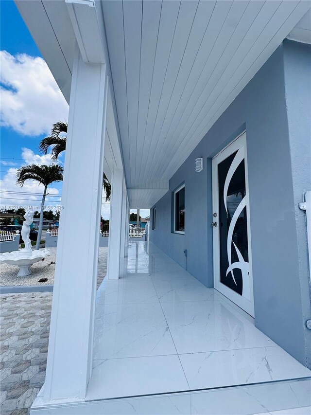 82 E 16th St, Hialeah, FL 33010 - porch with an attached carport