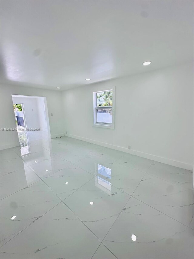 82 E 16th St, Hialeah, FL 33010 - unfurnished room featuring baseboards and recessed lighting