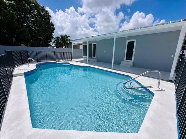 82 E 16th St, Hialeah, FL 33010 - outdoor pool featuring a patio area and entry steps