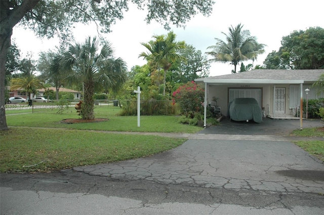 12385 NW 4th Ave, North Miami, FL 33168 - view of property exterior featuring driveway and an attached garage