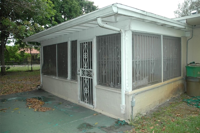 12385 NW 4th Ave, North Miami, FL 33168 - view of side of property featuring a sunroom