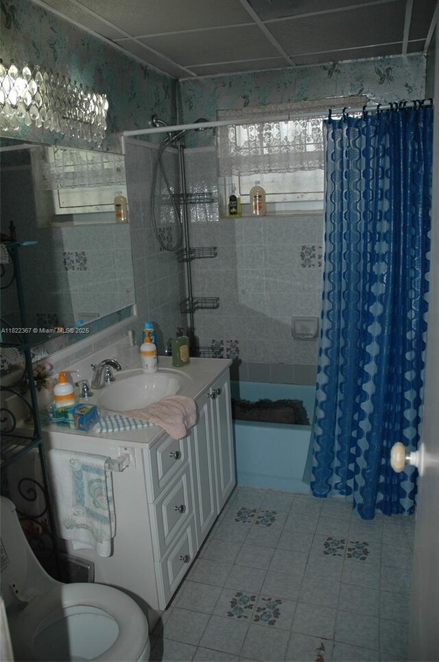 12385 NW 4th Ave, North Miami, FL 33168 - bathroom with tile patterned floors, shower / bath combination with curtain, and vanity