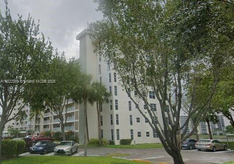 3090 N Course Dr Unit 807, Pompano Beach, FL 33069 - view of property with uncovered parking
