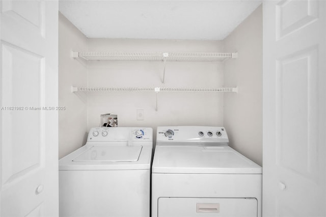 811 Lyons Rd Unit 20203, Coconut Creek, FL 33063 - laundry room featuring independent washer and dryer