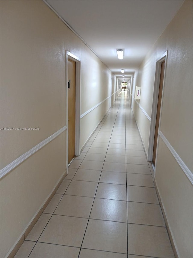 2055 SW 122nd Ave Unit 113, Miami, FL 33175 - hallway with light tile patterned flooring