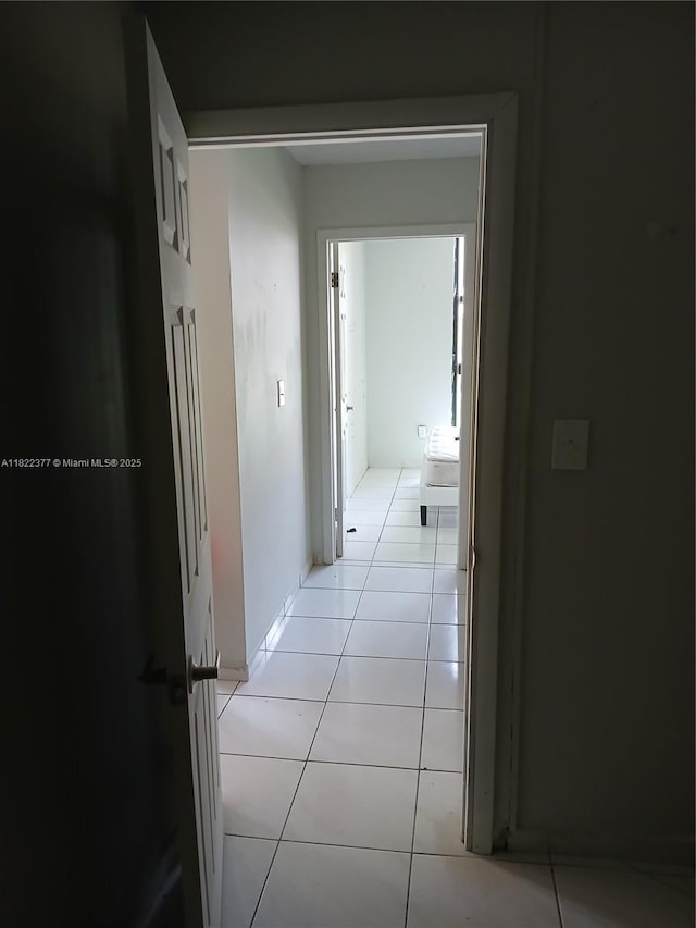 2055 SW 122nd Ave Unit 113, Miami, FL 33175 - hall featuring light tile patterned flooring