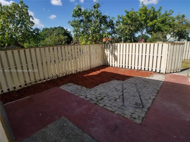 5834 NW 21st St Unit 41-B, Lauderhill, FL 33313 - fenced backyard featuring a patio