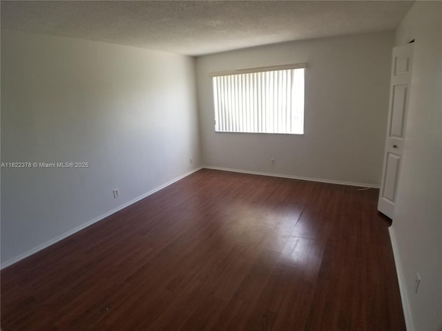 5834 NW 21st St Unit 41-B, Lauderhill, FL 33313 - unfurnished room with dark wood-style flooring and baseboards