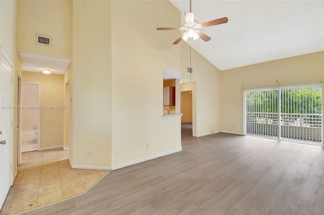 3401 NW 44th St Unit 201, Oakland Park, FL 33309 - empty room featuring high vaulted ceiling, ceiling fan, and light wood finished floors