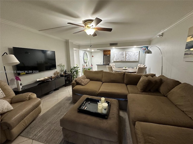 5160 Las Verdes Cir Unit 103, Delray Beach, FL 33484 - living room featuring light tile patterned floors, crown molding, and a ceiling fan