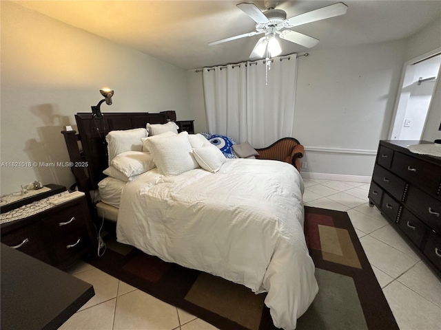 5160 Las Verdes Cir Unit 103, Delray Beach, FL 33484 - bedroom with light tile patterned floors and a ceiling fan