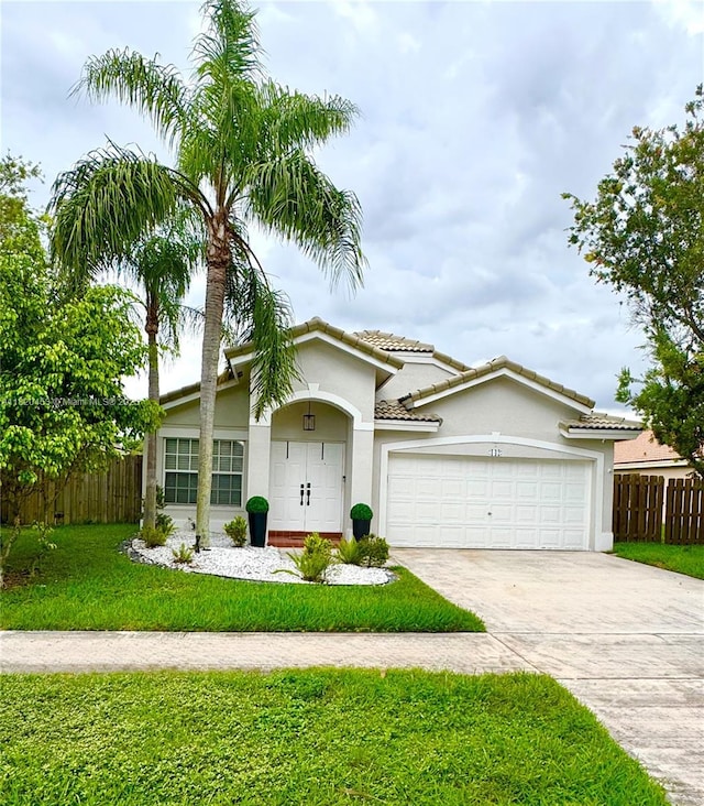 142 SW 204th Ave, Pembroke Pines, FL 33029 - view of front of property with driveway, an attached garage, and stucco siding