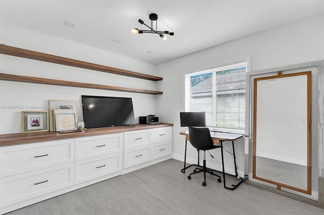 142 SW 204th Ave, Pembroke Pines, FL 33029 - office area featuring light wood-style flooring and a chandelier
