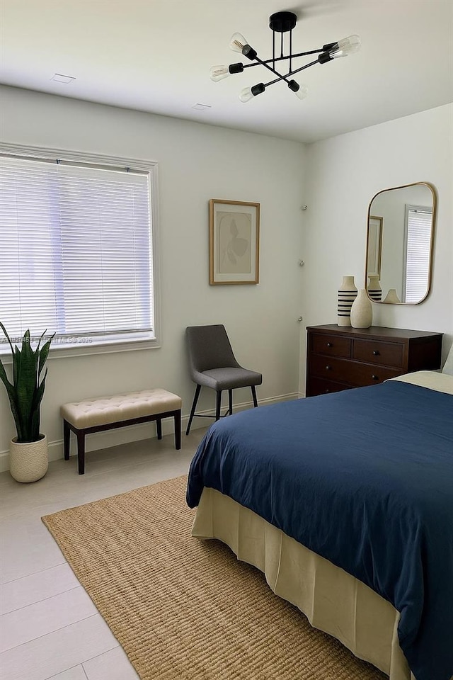 142 SW 204th Ave, Pembroke Pines, FL 33029 - bedroom with a chandelier and baseboards