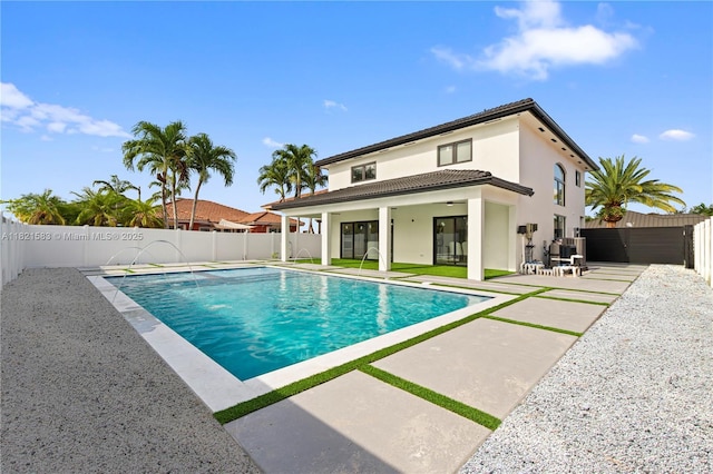 3002 SW 151st Ct, Miami, FL 33185 - view of swimming pool with a patio and a fenced backyard