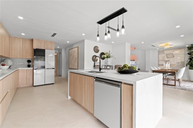 3002 SW 151st Ct, Miami, FL 33185 - kitchen featuring modern cabinets, light brown cabinetry, dishwasher, freestanding refrigerator, and recessed lighting