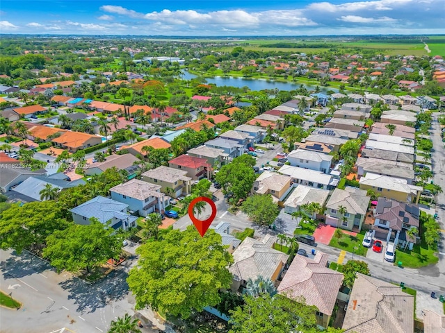 16101 SW 104th Ter, Miami, FL 33196 - aerial perspective of suburban area with a nearby body of water
